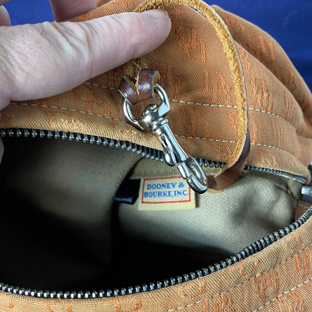 Dooney & Bourke Vintage burnt Orange over the shoulder bucket Bag